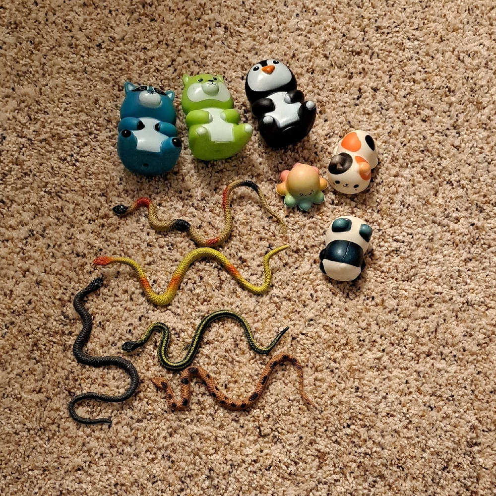 11 Colorful Animal Figurines and Toy Snakes